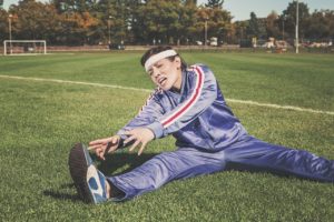 Guitar warm up exercises - athlete stretching